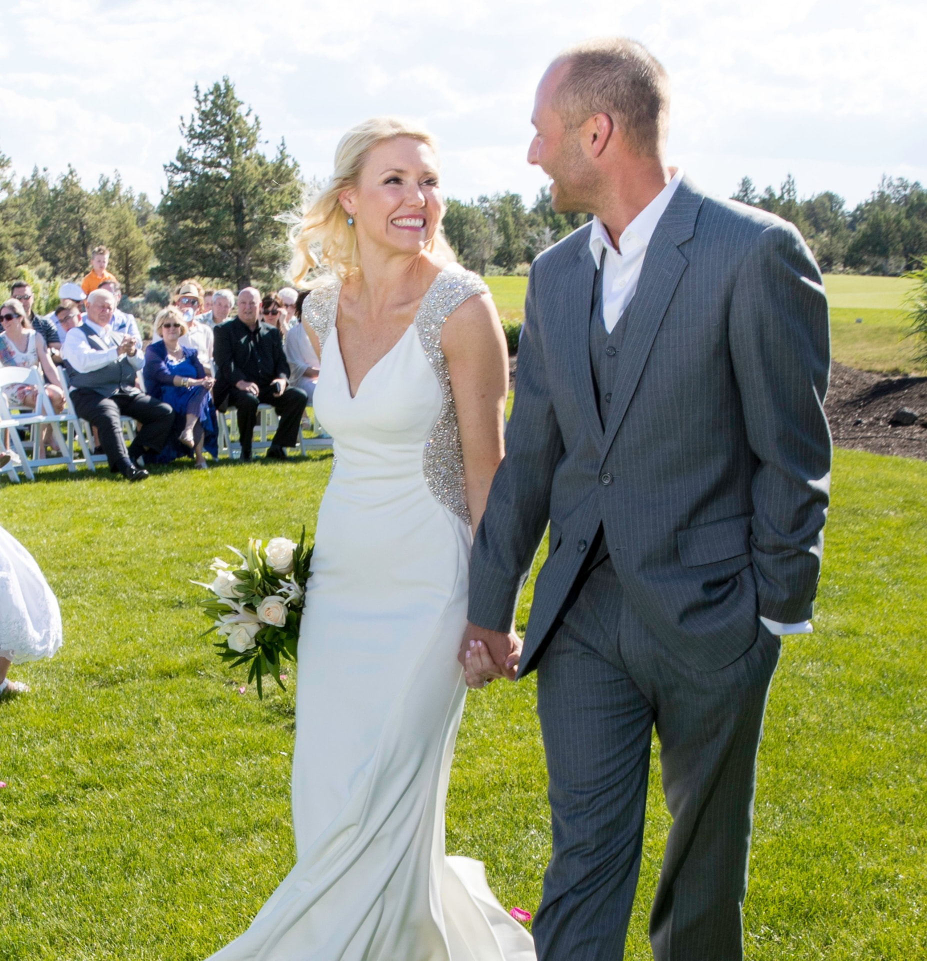 Pippa and Eric walking down the aisle at their wedding